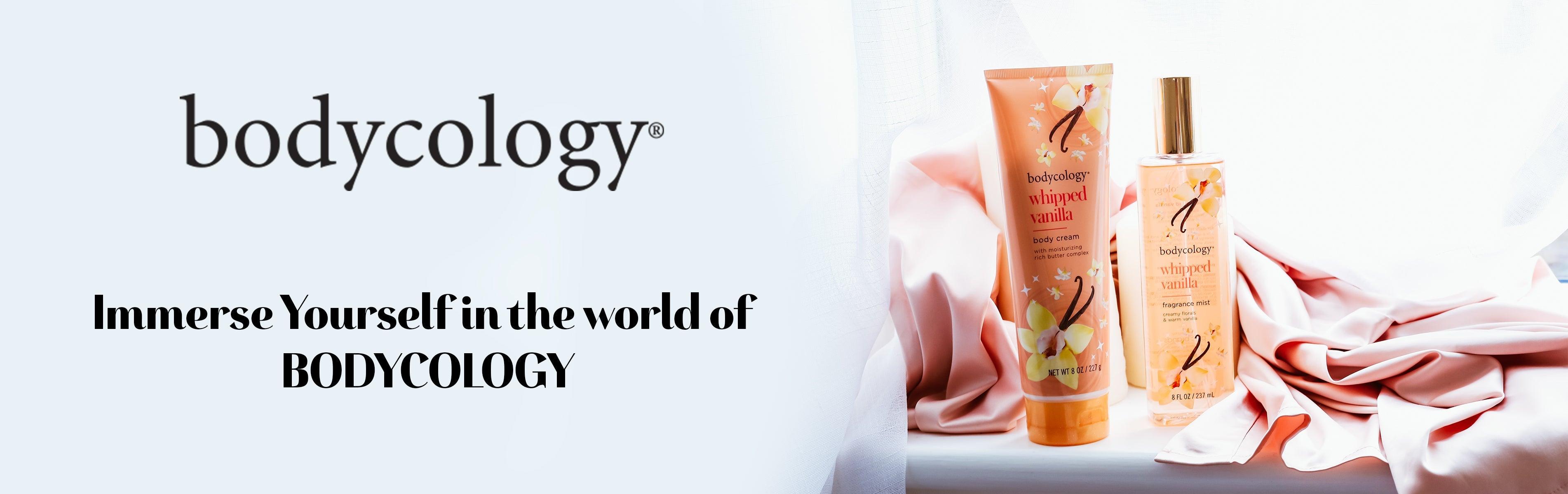 Bodycology Whipped Vanilla body cream and fragrance mist displayed on soft pink fabric by a window