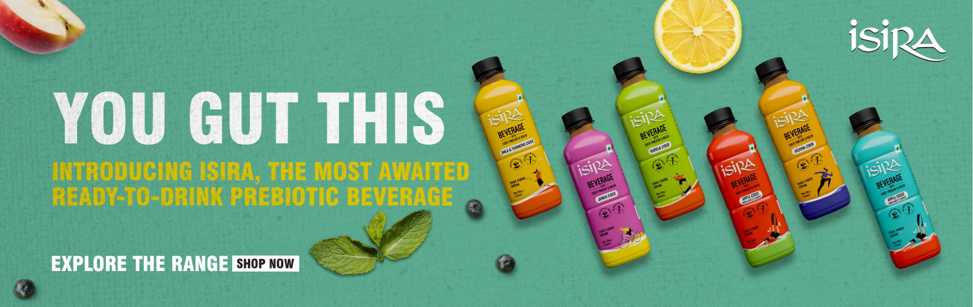 Isira prebiotic beverages in colorful bottles with apple, lemon, mint, and blueberries on green background