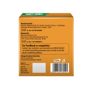 Back of orange product box showing manufacturing details, FSSAI license, customer care info, storage instructions, barcode, and Make in India logo
