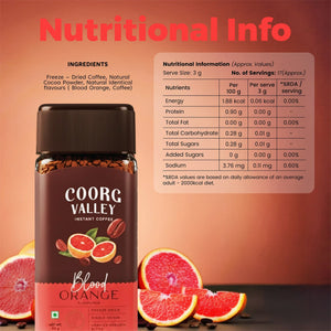 Coorg Valley Blood Orange Instant Coffee jar with nutritional info, freeze-dried, single origin, surrounded by fresh blood orange slices.