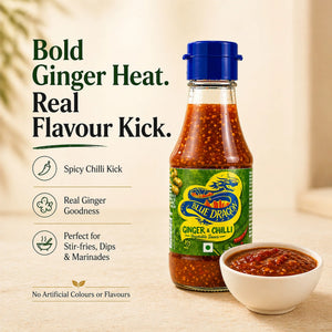Blue Dragon ginger and chilli sauce bottle with a small bowl of sauce, spicy Asian condiment