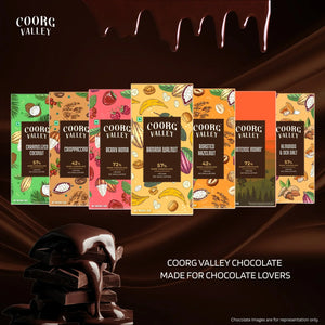 Coorg Valley dark chocolate bars including Caramelized Coconut, Crispaccino, Berry Bomb, Banana Walnut, Roasted Hazelnut, Intense Indian, and Almonds & Sea Salt