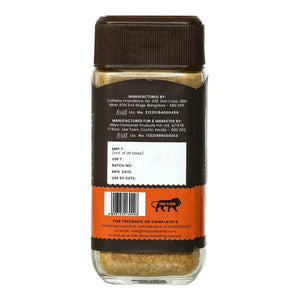 Back label of a jar of toffee caramel powder, showing manufacturing details and barcode.