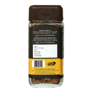 Back view of instant coffee jar with label details, brown lid, barcode, and Made in India logo