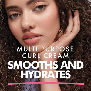 Close-up of woman with curly hair and natural makeup promoting multi-purpose curl cream that smooths and hydrates