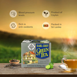 Earl Grey green tea box with bergamot, loose tea, and glass cup; Ceylon product benefits displayed