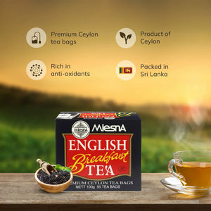 English Breakfast Tea box with Ceylon tea claims, loose tea leaves, and poured tea in glass cup