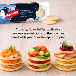 Original rice crackers with assorted gourmet toppings, product pack in background