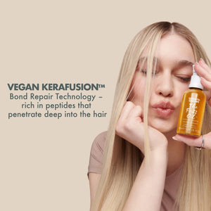 Blonde woman holding Umberto Giannini The Frizz Oil with Vegan Kerafusion bond repair for deep hair peptide treatment