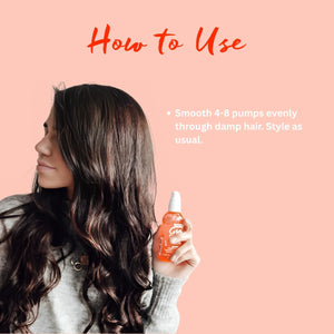 Woman with long dark hair holding orange styling serum bottle with usage instructions on peach background