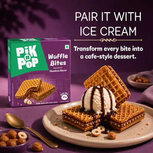 Hazelnut waffle bites with ice cream, chocolate drizzle, and whole hazelnuts on a plate, paired with product box.