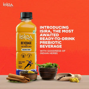 Isira Arjuna Cider prebiotic beverage bottle with Indian herbs, cinnamon sticks, and spices on table