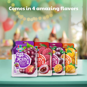 Assorted fruit jelly pouches in four flavors, displayed on a table with a party background.