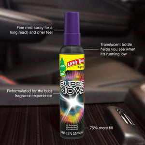 Little Trees Supernova Spray air freshener bottle inside a car, labeled with product features.