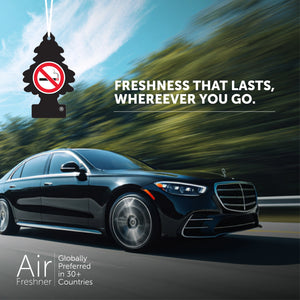 Black car driving fast on road with Little Trees no smoking air freshener hanging inside