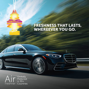 Little Trees Sunset Beach car air freshener hanging in luxury black car with text freshness that lasts
