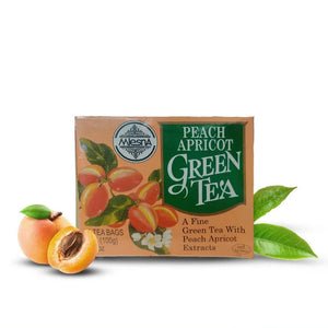 Mesna Peach Apricot Green Tea box with tea bags, fresh apricots, and green tea leaves, premium imported beverage