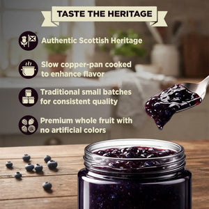 Open jar of blueberry preserve with spoonful, fresh blueberries, heritage and quality claims text