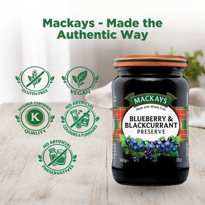 Mackays Blueberry & Blackcurrant Preserve jar on a table, showing vegan, gluten-free, kosher certified, no artificial preservatives or colours icons.