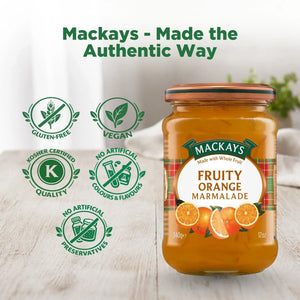 Mackays Fruity Orange Marmalade jar on table with gluten-free, vegan, kosher, no artificial colours or preservatives icons.