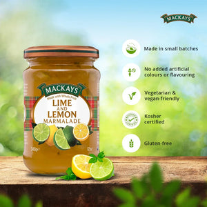 Mackays Lime and Lemon Marmalade jar with fresh lime and lemon slices on wooden surface, gluten-free vegan spread