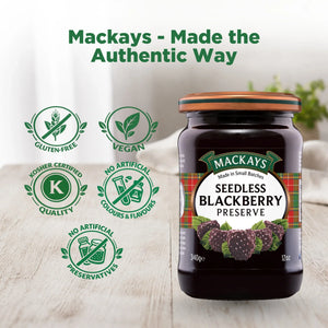 Mackays Seedless Blackberry Preserve jar on table with gluten-free, vegan, kosher, and no artificial additives icons.