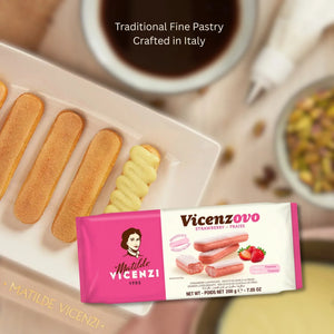 Italian strawberry ladyfingers with cream on plate, coffee, pistachios, and product packaging