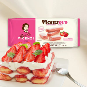 Strawberry tiramisu dessert with fresh strawberries and cream beside Matilde Vicenzi Vicenzovo strawberry ladyfingers package