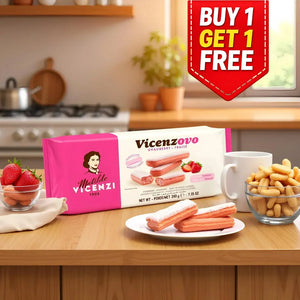 Vicenzovo strawberry ladyfinger biscuits with powdered sugar, fresh strawberries, and coffee mug on kitchen counter