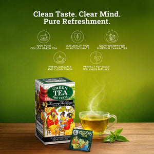 Box of premium green tea with a glass cup of brewed green tea, tea bag, and fresh leaves on wooden table, green background