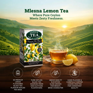 Box of lemon flavoured black tea, glass cup of tea, and lemon on table with tea plantation background.