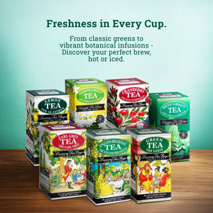 Assorted luxury tea boxes including mint green, lemon, earl grey, green, jasmine, cranberry, and English breakfast tea on a wooden surface.
