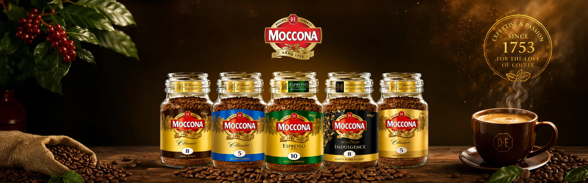 Moccona instant coffee jars with rich roast varieties, coffee beans, and a steaming cup on a rustic table.