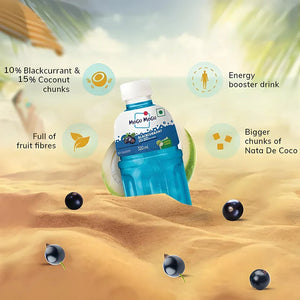 Blue Mogu Mogu Blackcurrant drink bottle with coconut and blackcurrant on sandy beach background