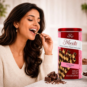 Woman enjoying Monetta chocolate creme filled wafer rolls, luxury gourmet snack imported to India