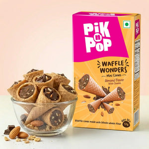 Glass bowl of almond chocolate mini waffle cones beside Pik n Pop Waffle Wonders box