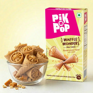 Glass bowl of butterscotch mini waffle cones beside Pik n Pop Waffle Wonders box
