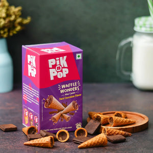 Pik n Pop Waffle Wonders mini cones dark chocolate flavor with cones and chocolate pieces on table