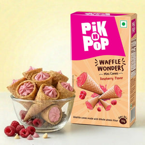 Raspberry mini waffle cones in a glass bowl beside Pik n Pop Waffle Wonders package