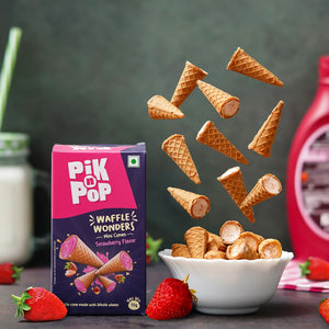 Pik n Pop Waffle Wonders mini strawberry cones in a bowl, box and strawberries nearby