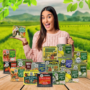 Woman holding a box of Sencha Japanese Green Tea with assorted tea boxes displayed, in a tea plantation setting.