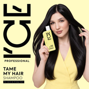 Woman holding I'ce Professional Tame My Hair Shampoo for dull and frizzy hair.