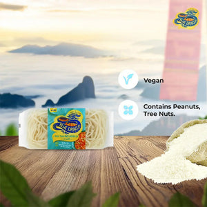 Blue Dragon Pad Thai rice noodles pack on wooden table with vegan label and rice sack