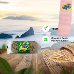 Blue Dragon Soba Noodles package on wooden table with grains and vegan, contains nuts labels