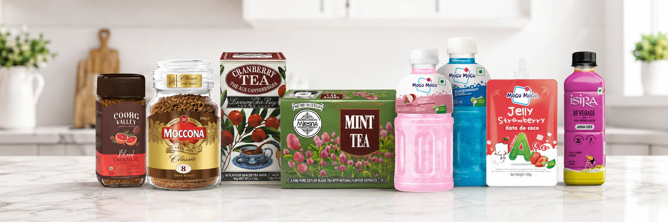 Assorted imported beverages and tea including peach juice, instant coffee, and green tea on display