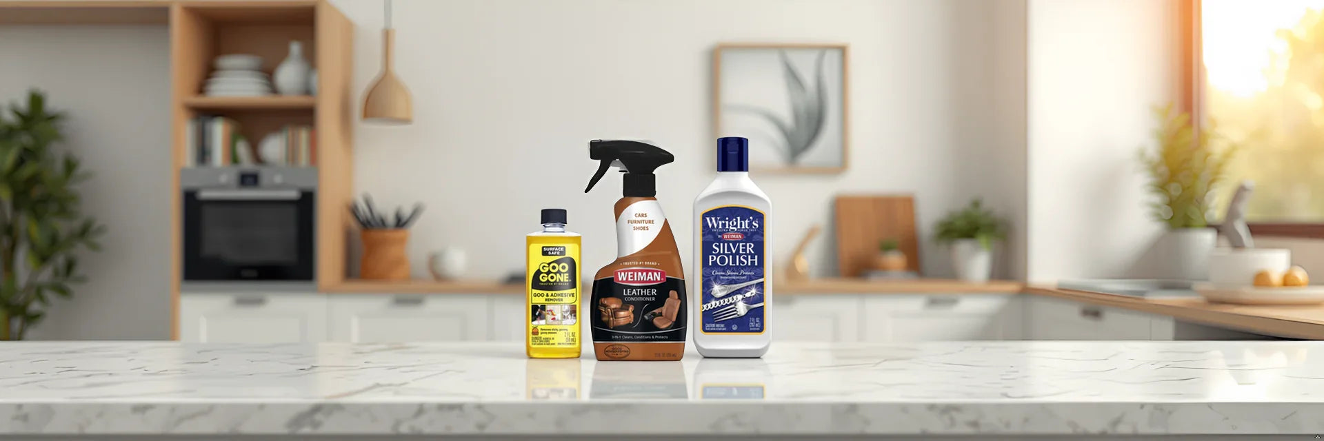 Goo Gone adhesive remover, Weiman leather conditioner, and Wright's silver polish on kitchen counter