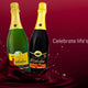 Non-Alcoholic Sparkling Juice bottles with vibrant splash, perfect for celebrations