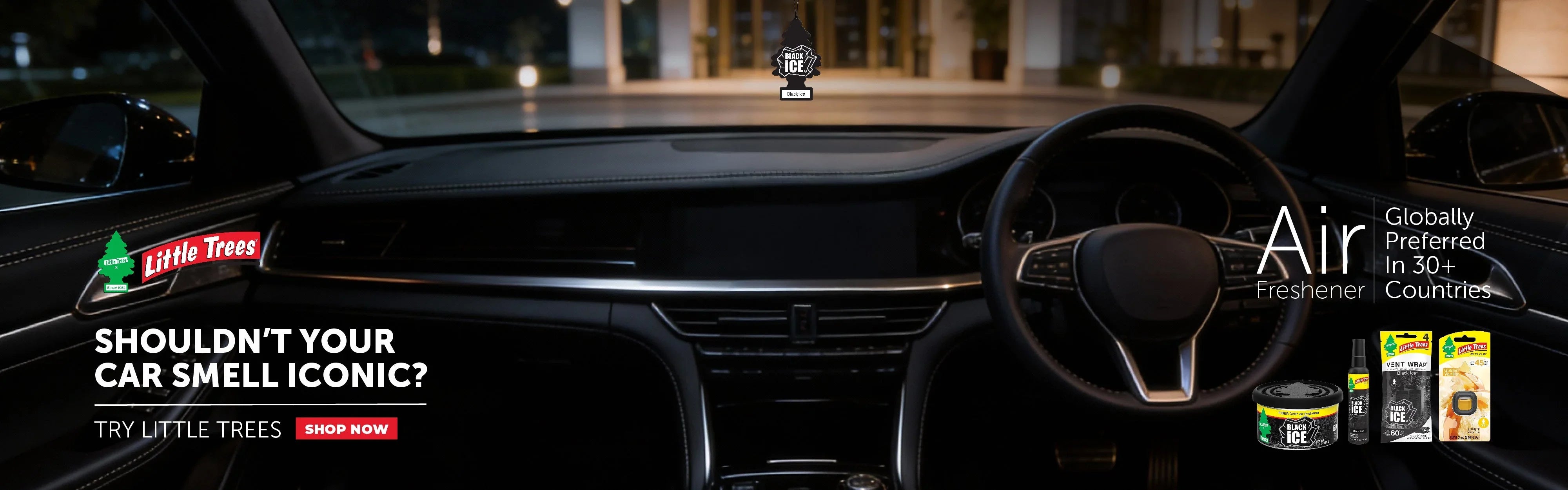 Little Trees Black Ice car air freshener hanging in luxury vehicle interior, iconic scent for cars