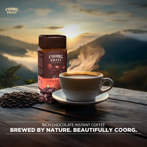 Coorg Valley instant coffee with a steaming cup of coffee and scenic background