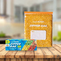 Medium zipper storage bag filled with lentils and product box on wooden table